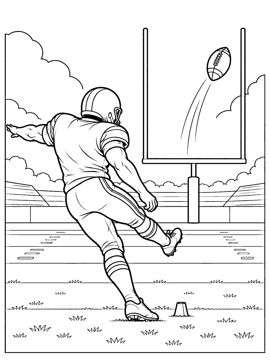 An American football kicker completing a field goal as the ball rises between plain goalposts.