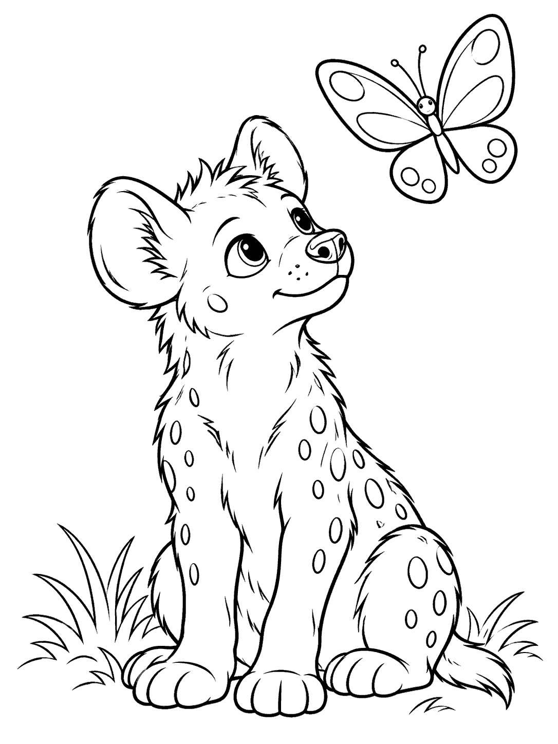 Seated spotted hyena cub looking up at a large butterfly, with grass around its paws.