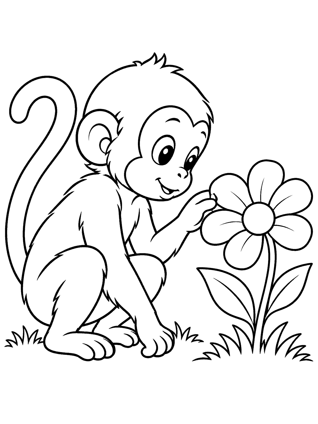 A crouching monkey reaches toward a large flower beside tufts of grass.