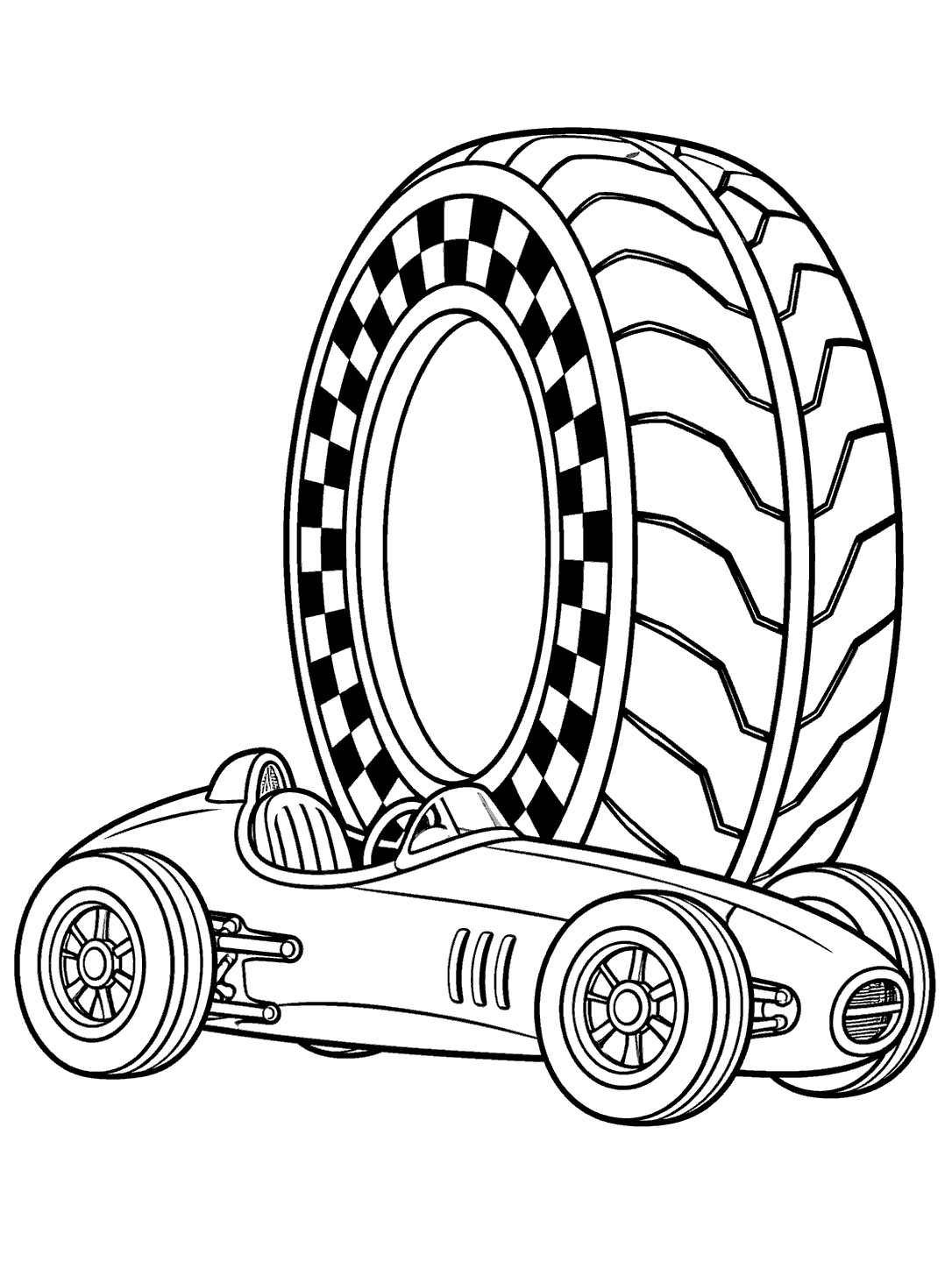 Classic race car in front of an oversized upright racing tire with a checkered rim