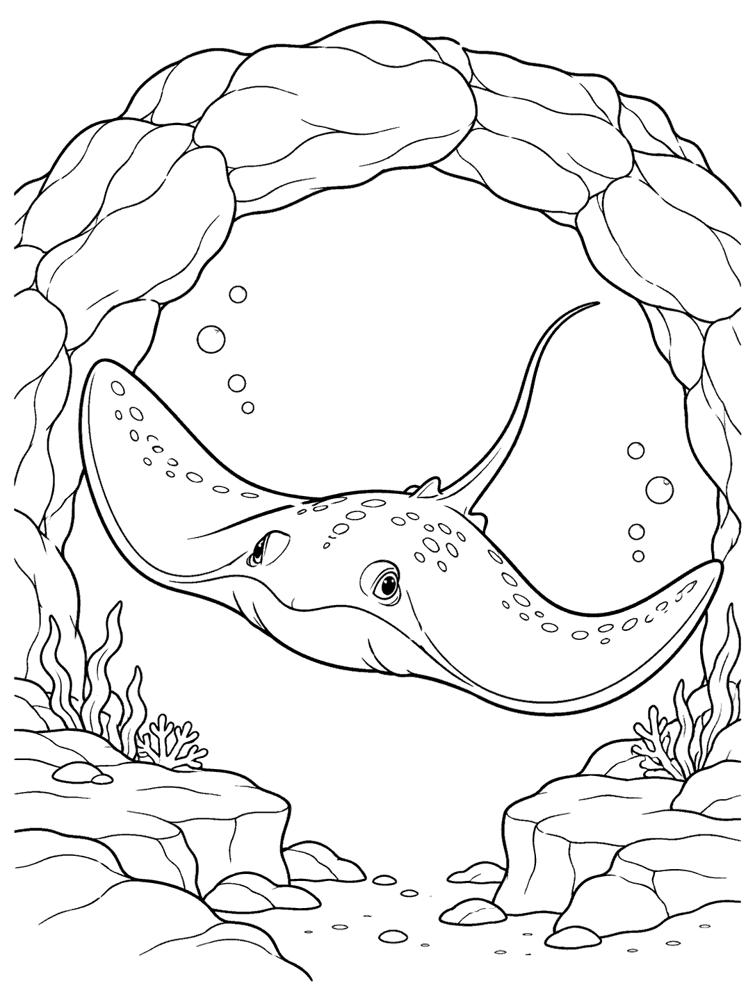 A spotted stingray with broad fins and a long tapered tail passing beneath a rock arch, surrounded by bubbles and simple ledges.